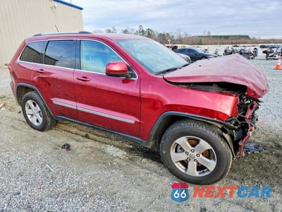 Czwarte zdjęcie samochodu z boku: 2012 JEEP GRAND CHEROKEE LAREDO VIN:1C4RJFAG3CC315459 - miniatura