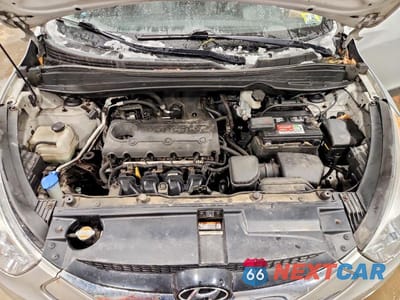 Zdjęcie 12 z 12 samochodu: 2010 HYUNDAI TUCSON VIN:KM8JUCAC8AU047186 - miniatura