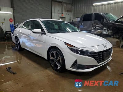 Czwarte zdjęcie samochodu z boku: 2023 HYUNDAI ELANTRA HYBRID LIMITED VIN:KMHLN4AJ3PU054629 - miniatura