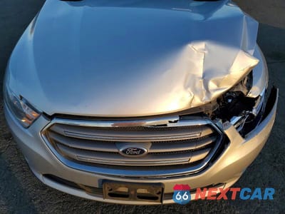 Zdjęcie 11 z 11 samochodu: 2013 FORD TAURUS SEL VIN:1FAHP2E85DG196075 - miniatura