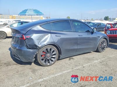 Trzecie zdjęcie samochodu z tyłu: 2022 TESLA MODEL Y VIN:7SAYGDEF2NF350499 - miniatura