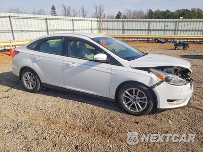 Czwarte zdjęcie samochodu z boku: 2015 FORD FOCUS SE VIN:1FADP3F24FL214817 - miniatura