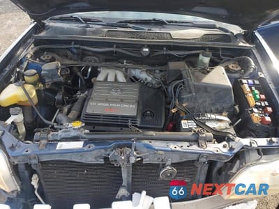 Zdjęcie 12 z 12 samochodu: 2003 TOYOTA HIGHLANDER BASE VIN:JTEHF21A330115843 - miniatura