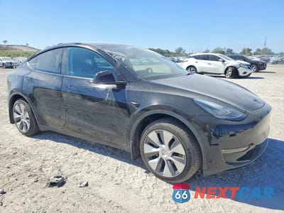 Czwarte zdjęcie samochodu z boku: 2023 TESLA MODEL Y VIN:7SAYGDEE8PA136981 - miniatura
