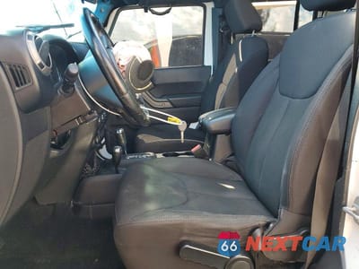 Zdjęcie 7 z 12 samochodu: 2014 JEEP WRANGLER UNLIMITED SPORT VIN:1C4BJWDG7EL156610 - miniatura