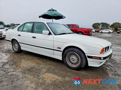 Czwarte zdjęcie samochodu z boku: 1995 BMW 525 I AUTOMATIC VIN:WBAHD6324SGK52977 - miniatura