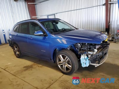 Czwarte zdjęcie samochodu z boku: 2018 BMW X1 XDRIVE28I VIN:WBXHT3C31J5K26962 - miniatura