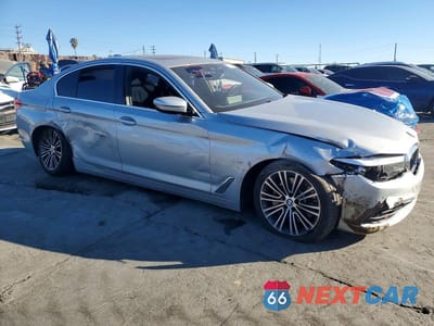 Czwarte zdjęcie samochodu z boku: 2020 BMW 530E VIN:WBAJA9C07LCD45109 - miniatura
