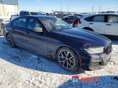 Czwarte zdjęcie samochodu z boku: 2022 BMW M550XI VIN:WBA13BK07NCK97744 - miniatura