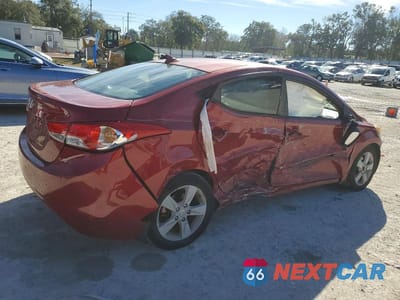 Trzecie zdjęcie samochodu z tyłu: 2013 HYUNDAI ELANTRA GLS VIN:KMHDH4AE9DU661306 - miniatura