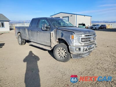 Czwarte zdjęcie samochodu z boku: 2022 FORD F350 SUPER DUTY VIN:1FT8W3BT8NED35317 - miniatura