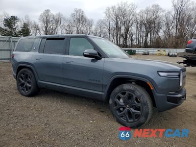 Czwarte zdjęcie samochodu z boku: 2025 RIVIAN R1S ADVENTURE VIN:7PDSGBBA4SN073036 - miniatura