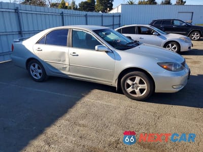 Czwarte zdjęcie samochodu z boku: 2003 TOYOTA CAMRY SE V6 VIN:JTDBF32K530113180 - miniatura