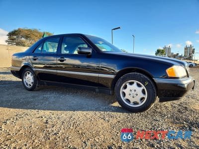 Czwarte zdjęcie samochodu z boku: 1997 MERCEDES-BENZ C 230 VIN:WDBHA23E5VF561641 - miniatura