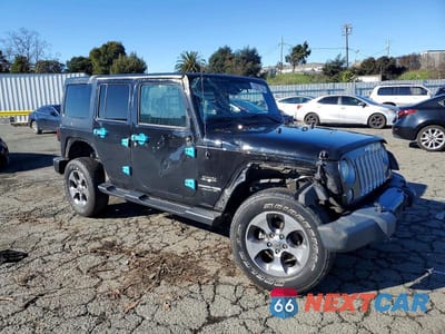 Czwarte zdjęcie samochodu z boku: 2018 JEEP WRANGLER UNLIMITED SAHARA VIN:1C4BJWEG1JL901411 - miniatura