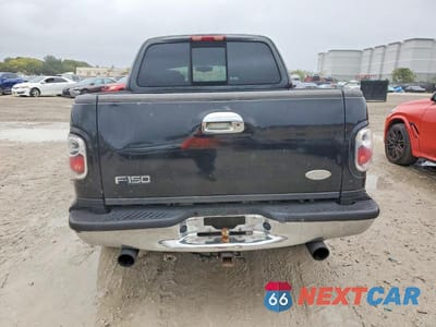 Zdjęcie 6 z 12 samochodu: 2001 FORD F150 SUPERCREW VIN:1FTRW07L21KC60105 - miniatura