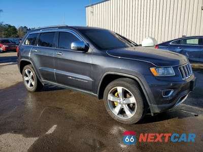 Czwarte zdjęcie samochodu z boku: 2014 JEEP GRAND CHEROKEE LIMITED VIN:1C4RJEBM2EC412475 - miniatura