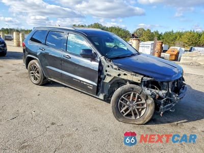 Czwarte zdjęcie samochodu z boku: 2016 JEEP GRAND CHEROKEE LAREDO VIN:1C4RJFAG4GC456935 - miniatura