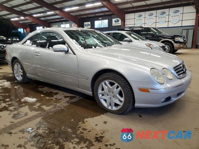 Czwarte zdjęcie samochodu z boku: 2002 MERCEDES-BENZ CL 500 VIN:WDBPJ75J82A022734 - miniatura