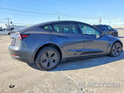 Trzecie zdjęcie samochodu z tyłu: 2023 TESLA MODEL 3 VIN:5YJ3E1EA0PF610756 - miniatura