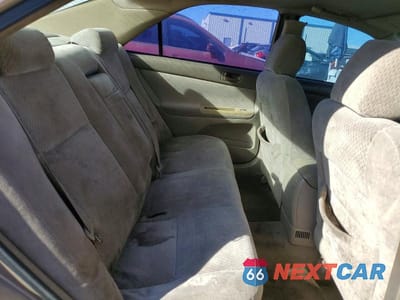 Zdjęcie 10 z 12 samochodu: 2004 TOYOTA CAMRY LE VIN:4T1BE32K74U801383 - miniatura