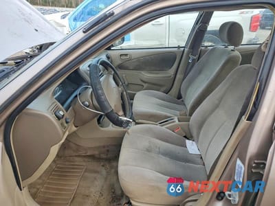 Zdjęcie 7 z 11 samochodu: 2002 TOYOTA COROLLA CE VIN:2T1BR12E02C533004 - miniatura