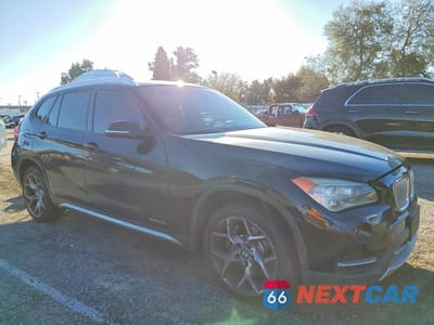 Czwarte zdjęcie samochodu z boku: 2014 BMW X1 XDRIVE35I VIN:WBAVM5C54EVV92069 - miniatura