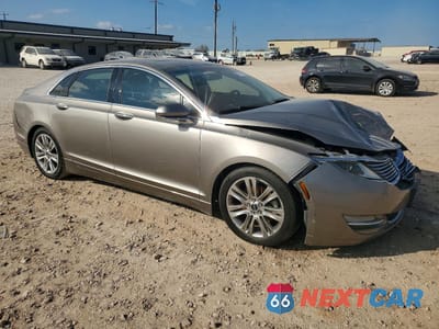 Czwarte zdjęcie samochodu z boku: 2015 LINCOLN MKZ VIN:3LN6L2GK8FR624976 - miniatura