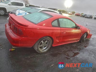 Trzecie zdjęcie samochodu z tyłu: 1998 FORD MUSTANG GT VIN:1FAFP42X5WF206594 - miniatura