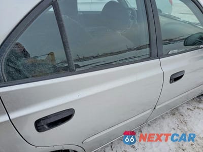 Zdjęcie 10 z 11 samochodu: 2002 HYUNDAI ACCENT GL VIN:KMHCG45C02U325127 - miniatura