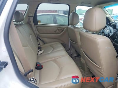 Zdjęcie 10 z 11 samochodu: 2003 MAZDA TRIBUTE ES VIN:4F2CZ06123KM25439 - miniatura