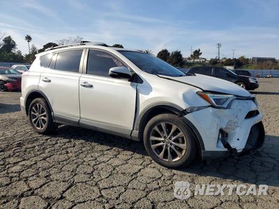 Czwarte zdjęcie samochodu z boku: 2017 TOYOTA RAV4 LIMITED VIN:JTMYFREV8HJ142029 - miniatura