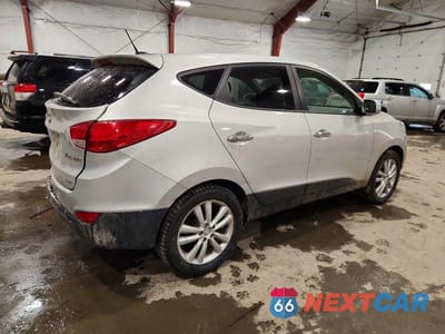 Trzecie zdjęcie samochodu z tyłu: 2010 HYUNDAI TUCSON VIN:KM8JUCAC8AU047186 - miniatura