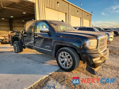 Czwarte zdjęcie samochodu z boku: 2018 GMC SIERRA K1500 DENALI VIN:3GTU2PEC6JG504153 - miniatura