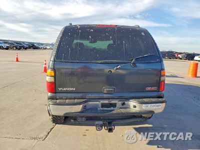 Zdjęcie 6 z 11 samochodu: 2004 GMC YUKON VIN:1GKEC13VX4R215367 - miniatura
