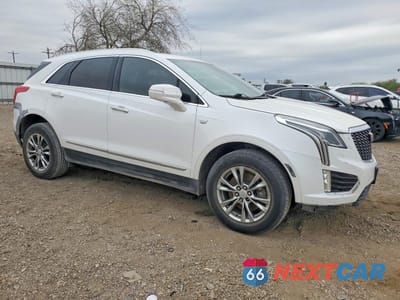 Czwarte zdjęcie samochodu z boku: 2020 CADILLAC XT5 PREMIUM LUXURY VIN:1GYKNCRS4LZ142801 - miniatura