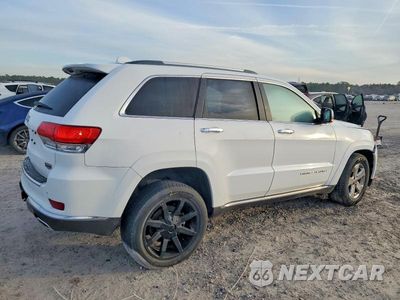 Trzecie zdjęcie samochodu z tyłu: 2014 JEEP GRAND CHEROKEE SUMMIT VIN:1C4RJFJT8EC346884 - miniatura