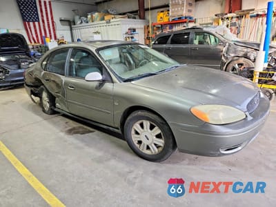 Czwarte zdjęcie samochodu z boku: 2004 FORD TAURUS SEL VIN:1FAFP56S94G166726 - miniatura