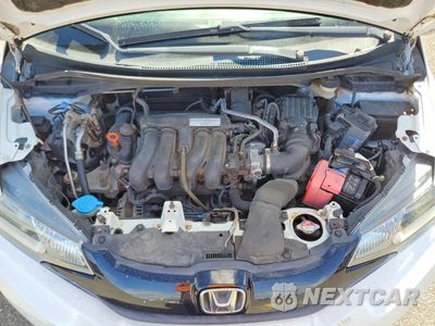 Zdjęcie 11 z 12 samochodu: 2015 HONDA FIT LX VIN:3HGGK5H56FM710520 - miniatura