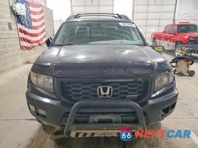 Piąte zdjęcie samochodu w środku: 2013 HONDA RIDGELINE SPORT VIN:5FPYK1F75DB009945 - miniatura