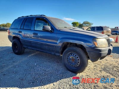 Czwarte zdjęcie samochodu z boku: 2001 JEEP GRAND CHEROKEE LAREDO VIN:1J4GW48S91C671624 - miniatura