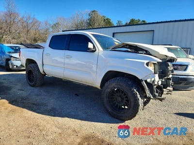 Czwarte zdjęcie samochodu z boku: 2017 TOYOTA TACOMA DOUBLE CAB VIN:5TFAX5GN5HX094314 - miniatura