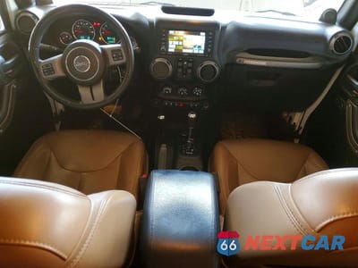 Zdjęcie 8 z 11 samochodu: 2013 JEEP WRANGLER UNLIMITED SAHARA VIN:1C4BJWEG5DL613413 - miniatura