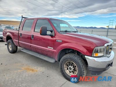 Czwarte zdjęcie samochodu z boku: 2004 FORD F250 SUPER DUTY VIN:1FTNW21P54EA35282 - miniatura