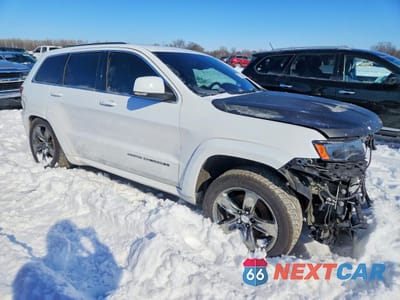 Czwarte zdjęcie samochodu z boku: 2015 JEEP GRAND CHEROKEE SRT-8 VIN:1C4RJFDJ9FC646185 - miniatura