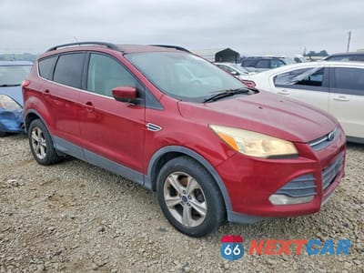 Czwarte zdjęcie samochodu z boku: 2016 FORD ESCAPE SE VIN:1FMCU9G91GUC63347 - miniatura