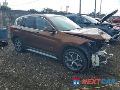 Czwarte zdjęcie samochodu z boku: 2017 BMW X1 XDRIVE28I VIN:WBXHT3C33H5F82651 - miniatura