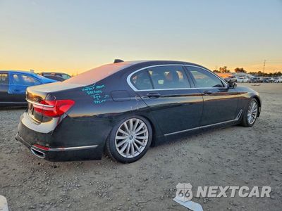 Trzecie zdjęcie samochodu z tyłu: 2017 BMW 740 I VIN:WBA7E2C57HG740342 - miniatura