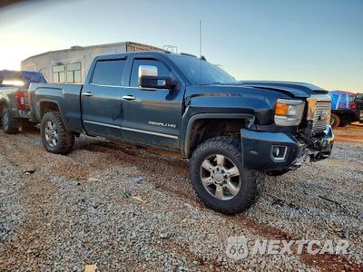 Czwarte zdjęcie samochodu z boku: 2017 GMC SIERRA K2500 DENALI VIN:1GT12UEY8HF160253 - miniatura