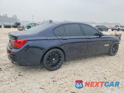 Trzecie zdjęcie samochodu z tyłu: 2015 BMW 750 I VIN:WBAYA8C53FD825759 - miniatura